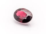 a pink tourmaline gems on a white background