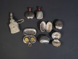 a lot of silver items that are on a table