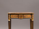 an image of a small table with a drawer underneath it