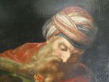 tableau représentant un homme barbu coiffé d'un turban en train de lire un livre