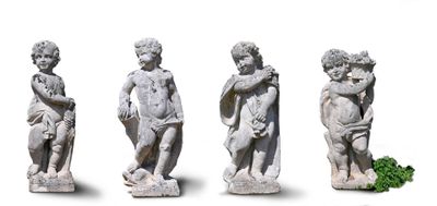 four statues of a boy and a girl on a white background