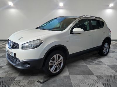 a picture of a white car parked in a garage