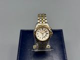 an image of a close up of a watch on a display stand