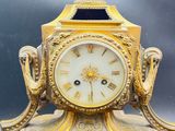 a clock that is sitting on top of a table