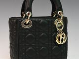 chanel black quilted leather handbag with gold hardware