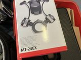 a box with a camera attached to it sitting on a table