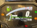 a close up of a speedometer on a motorcycle