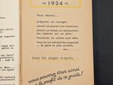 an open book on a black table with a yellow border