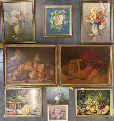many pictures of fruit and flowers displayed on the wall