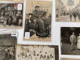 several old black and white photographs of people and cars