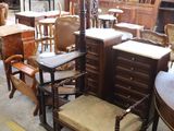 many chairs and tables in a room with a lot of furniture