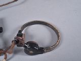 a ring that has a handle and a key on it