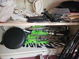 a shelf that has many different tools on it
