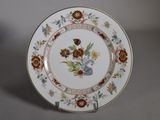 a white plate with a floral design on it