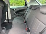 the back seats of a car are empty with no one in it