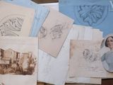 a lot of old photos on the table