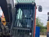 an image of a backhoe of a construction vehicle