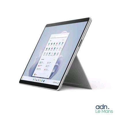 a tablet computer sitting on top of a stand