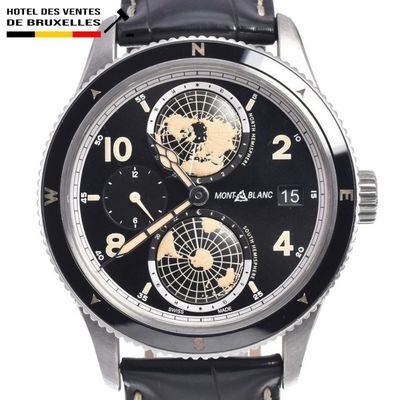 a close up of a wrist watch with a world map on it