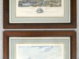 two framed pictures of ships on a wall in a room