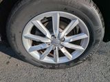 a close up of a tire on a car ' s rim