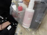 a lot of items that are sitting on a bed