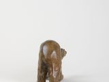 wooden bear figurine on a white background