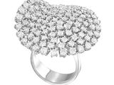 a close up of a diamond ring on a white background