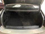 a trunk of a car with the back door open