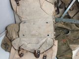 a pile of old military items on the floor