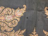 an image of a close up of a piece of fabric with a bird on it