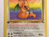 a close up of a pokemon card with a dragon on it