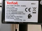 a label on the back of a machine that is sitting on a table