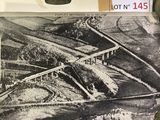 a picture of a picture of a train on the tracks