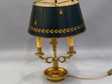 an image of a table lamp with a green shade on it