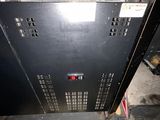 a black oven that is sitting on the floor