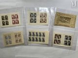 several different types of stamps are displayed in a display case