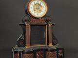 a clock that is sitting on top of a table