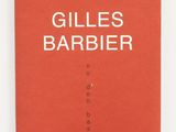 a red book with the title gilles barber on it