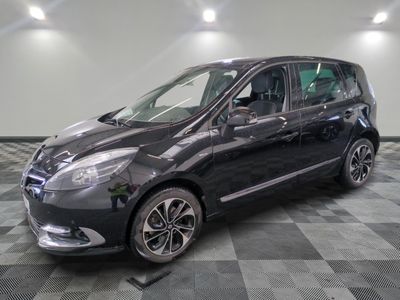a picture of a black car parked on a checkered floor