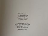 an open book with a black and white picture on it