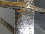 a close up of a knife with a metal handle