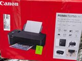 a box with a printer on it sitting on a shelf