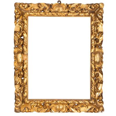 an antique gold picture frame with a white background