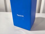 a blue box sitting on top of a white table
