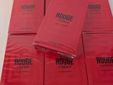red books stacked on top of each other on a table