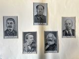 five portraits of men with beards and mustaches on a wall