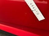 a picture of a sticker on the hood of a red car