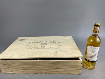 a wooden box with a bottle of wine next to it