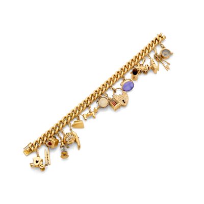 a gold bracelet with charms and charms on it